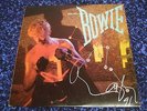 David Bowie Signed Let's Dance LP. Signed in Silver Paint Pen.... Very Nice