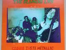 FLAMING LIPS-GREEN VINYL-CLOUDS TASTE METALLIC