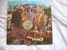 The Beatles ( Picture disc ) Sgt Pepper album.