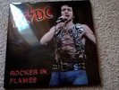 AC/DC ROCKER IN FLAMES DBL ALBUM IN CLEAR VINYL SWINGIN PIG (EX/EX)