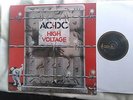 ACDC. HIGH Voltage - on mottled red vinyl. European issue.