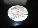 Badman /  Tim Austin  ?– War For '94 / The Rising  USED 12' IQ Records 1994