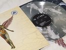 NIRVANA IN UTERO  LP LIMITED  EDITION  VINYL CLEAR + POSTER  TOP MINT.