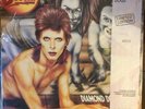 DAVID BOWIE - DIAMOND DOGS  STILL SEALED RYKO DMM REMASTER CLEAR VINYL   # 01737
