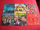 6 christmas records, motown, bing, pretenders, partridge family, band aid -etc