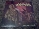 TOXIC HOLOCAUST.ORIGINAL WHITE VINYL LPHELL ON EARTH.W/SHRINK WRAP.INSERT.MINT