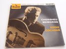 EDDIE COCHRAN , CHERISHED MEMORIES EP . LISTEN TO BOTH SIDES .