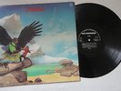 BUDGIE,NEVER TURN YOUR BACK ON A FRIEND,UK 1ST PRESS,BLACK SILVER LABELS,1 STAMP