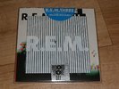 R.E.M. Three collapse into now 3 x 7