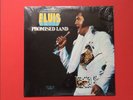 ELVIS PRESLEY- HARD TO FIND QUADRADISC SEALED PROMISED LAND