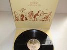 GENESIS-A TRICK OF THE TAIL.SUPERB UK PRESS NEAR MINT VINYL LP RECORD 1976