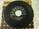 That'll be the Day / Rock around with Ollie vee buddy holly and  Three tunes 45