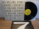THE ROLLING STONES - SUCKING IN THE SEVENTIES RARE GERMAN LP IN MINT CONDITION