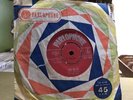 UK original of The Beatles: Love me do, on red Parlophone: made in GB on label.