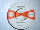 UK ISLAND WI 103-DELROY WILSON-BACK-BITER/ONE-TWO-THREE-NR EX