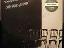 ? 33 T VINYL - JEAN JACQUES GOLDMAN - ENTRE GRIS CLAIR ET GRIS FONCÉ ?