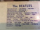 Beatles White Album with song sticker  , lp ex condition plays great misspell