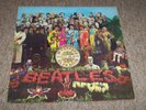 THE BEATLES , SGT PEPPERS LONELY HEARTS CLUB BAND . LISTEN .