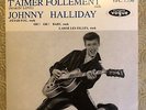 vinyle Johnny Halliday t'aimer follement est écris en bleu. 45T