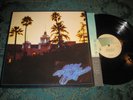 THE EAGLES   HOTEL CALIFORNIA LP NEAR MINT ORIGINAL PRESS WITH POSTER