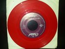 Beatles red 45 jukebox record.  lucy in the sky with diamonds