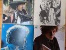 Bob Dylan.  Four LP's.  Planet Waves, Desire, Greatest Hits, More Greatest Hits