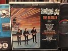 The BEATLES / SOMETHING NEW 1964 orig. ST 2108 IN SHRINK plays a strong EX