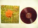 THE VINCE GUARALDI TRIO VINYL ROUGE MOUCHETÉ DE NOIR 33 T