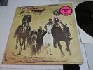 the DOOBIE BROTHERS Stampede Rare PROMO Label  LP w/inner lyric sleeve VINYL NM