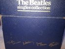 the beatles vinyl singles box set 45 rpm.