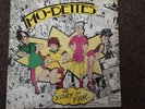 The Mo-dettes- The Story So Far Vinyl SML 1120 (with Sticker)