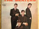 Introducing... The Beatles  Ad Back mono version 1 VJ 1062