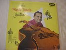 MERLE TRAVIS  the merle travis guitar, strong vg++ on CAPITOL, TOURQUOISE 1956