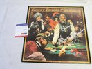 KENNY ROGERS THE GAMBLER VINYL RECORD WITH AUTOGRAPHED COVER. PSA/DNA. USED.