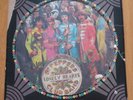 The Beatles - SGT Pepper  USA 1978 Capitol Picture Disc LP . Cut out sleeve.