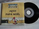 SP 45 T VINYLE 2 TITRES , TRUST , PETIT PAPA NOEL . VG + / VG + . rare .