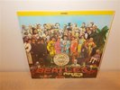 * The Beatles . Sgt. Pepper Lonely Hearts Club Band . Marble Vinyl . Insert . LP