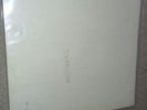 BEATLES WHITE ALBUM SECOND U.K DARK APPLE WITH NO SOLD IN U.K ON LABEL.