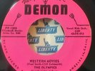 Olympics    Demon 1508  WESTERN MOVIES  (GREAT ROCK N ROLL 45) PLAYS LIKE NEW