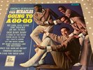 smokey robinson and the miracles - going to a go-go lp - tamla motown