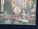 The Beatles Sgt Pepper LP First Press PMC 7027+Inner cut outs record is ex-