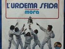 L'Ira Dei Trinità ?– l'urdema sfida / Mora - VINILE 7