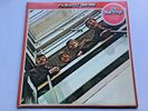 BEATLES / 1962-1966 RED  VINYL DOUBLE LP STICKERED SLEEVE NEAR MINT DISC'S