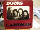 L.A. Woman by The Doors with the negative film type picture on the cover