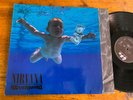 LP Europe 1991  Nirvana ?– Nevermind Label: Geffen Records ?– GEF 24425, DGC ?
