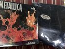 2 originally sealed Metallica LPs. Load And Enter Sandman