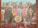 The Beatles Sgt Pepper vinyl first pressing PMC 7027. Super copy with inner