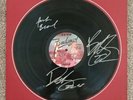 ZZ Top Fandango. Mounted. Signed by all 3 band members in silver paint pen.