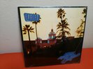 The EAGLES  - HOTEL CALIFORNIA 1976 ELEKTRA RECORDS VINYL RECORD LP W/ POSTER