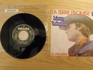 45 .T. JOHNNY HALLYDAY..La terre promise.. pressage.Madagascar